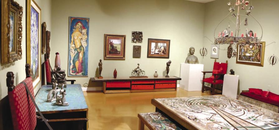 A room at the Steffan Thomas Museum of Art filled with the art of Steffen Thomas.