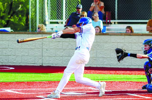 LOA senior Harrison Tolleson (10) turns on an inside pitch and drives it into left field during the regular-season finale against ACE Charter on April 19.