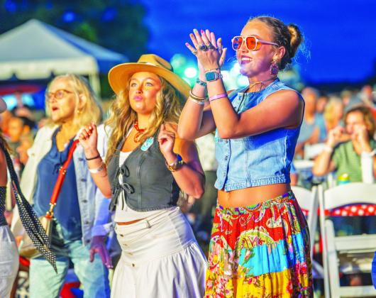 Music fans were frequently brought to their feet during the OPAS concert at The Farm at Oconee, whether dancing the night away or simply to provide a standing ovation for the performers onstage. CONTRIBUTED