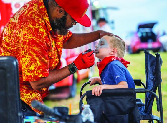 Younger music fans had plenty to see and do as well, including getting their faces painted for the OPAS occasion. CONTRIBUTED
