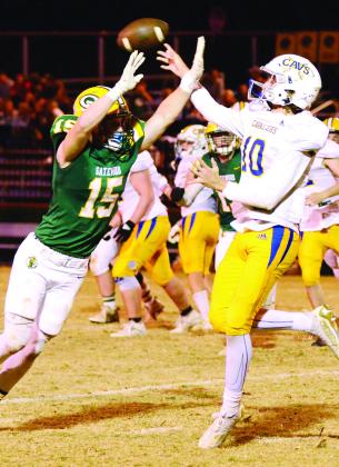Gators’ senior Lawson Wooten, shown here deflecting a pass attempt by freshman APD quarterback Carter Chavous, had a great game on both sides of the ball for Gatewood Friday night. IAN TOCHER/Staff