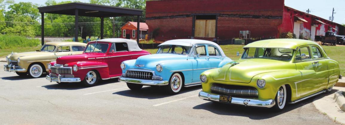Over 30 antique Hot Rods are lined up outside Livery Studio for a Hot Rods &amp; Pinups photoshoot. ARELLA CASH/Staff