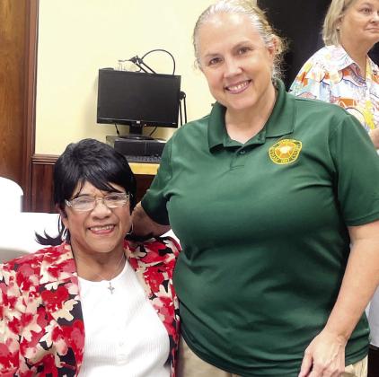 Helen Nelson and Lt. Tracey Pitoccheli reminisce how they became friends many years before Pitoccheli became a deputy and worked for PCSO. LYNN HOBBS/Staff