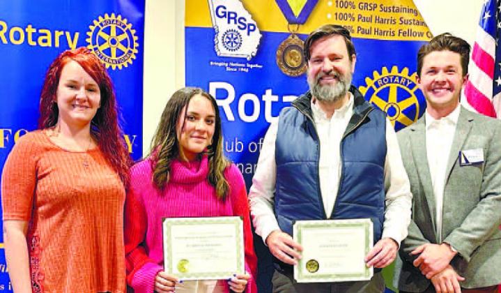 Nicki Fowler, Jaida Jackson, and Jonathan Deen of Putnam County High School pose with Rotarian Dr. Tyler Franks. CONTRIBUTED