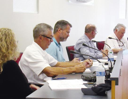 The Greene County Commission Tuesday approved an updated version of the 5-year Comprehensive Plan which is more detailed that previous plans. Greene County Commissioner Jeffery Smith (Dist. 2, second from left) said the Comprehensive Plan is ever more important because of the continuing development in the county. MARK ENGEL/Staff