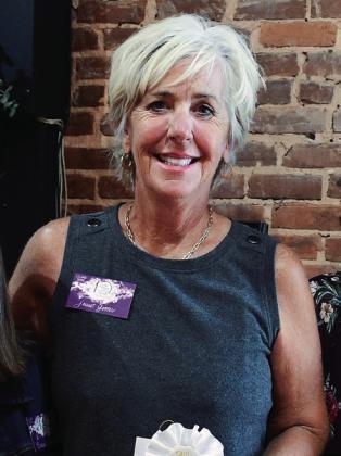 Janet Getter’s painting, Gathered, earned third place overall.  IAN TOCHER/Staff
