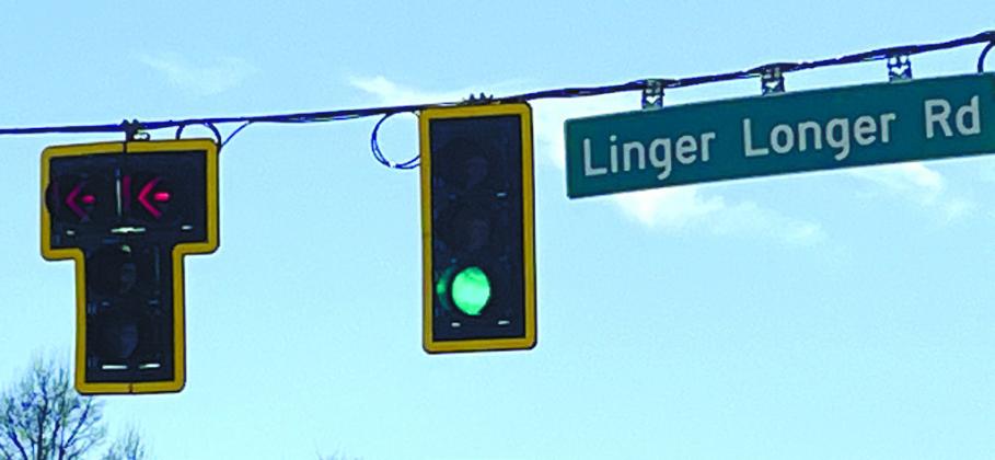 Double red arrows added by GDOT on Feb. 9 limited left turns from Highway 44 onto Linger Longer Drive. MARK ENGEL/Staff