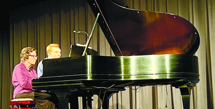 Festival Hall unveiled its new Steinway piano during a Piano and Art Celebration July 19. CONTRIBUTED