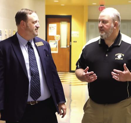 Schmuhl walks the halls with GCHS Principal John Ellenberg. CONTRIBUTED