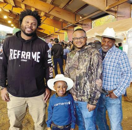 Little Jayden Lewis, 5 of Madison, pictured with family members (L-R) Ronnie James, Melvin Brown and Grandpa Ronnie Lewis.