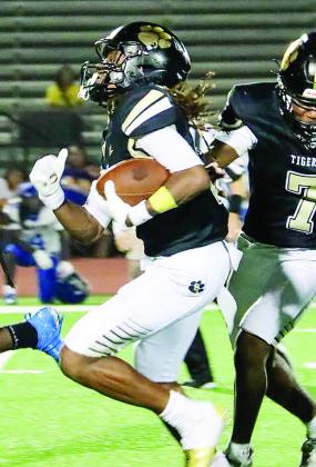 Greene County junior Kaden Cummings (3) rushed for 96 yards on eight carries and scored two touchdowns, including the game-winning score, in the Tigers’ win over Wilkinson County on Aug. 28. MOMMA D’S PIX/Contributed
