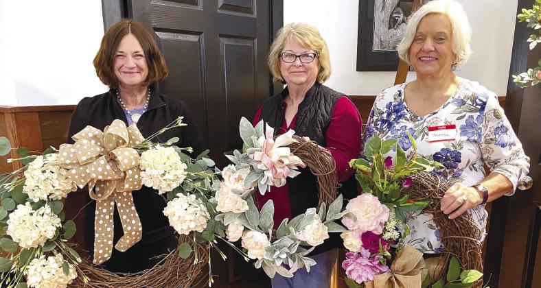 Rebecca McRobbie, Teresa Schultz and Linda Base Moore enjoy the Spring Wreath Class.