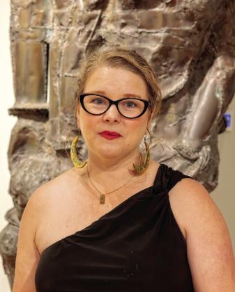 Crystal Jackson in front of one of Steffen Thomas’s sculptures. Crystal is the marketing &amp;amp; social media director for the museum. LEIGH LOFGREN/Staff