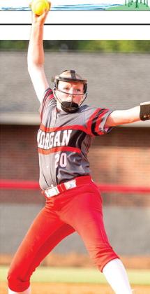 Morgan County pitcher Sidney Fischer delivers a pitch from the circle during the Bulldogs’ season-opening game against Walnut Grove. SKYLA MORRIS/Staff