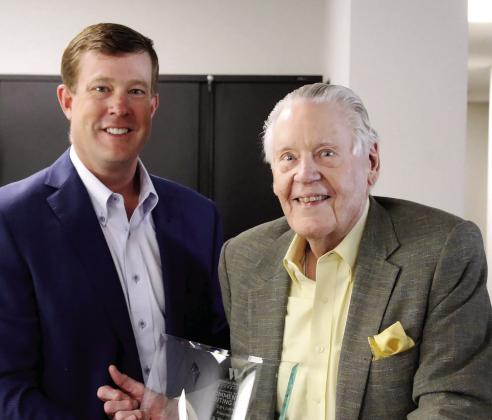 Marietta Daily Journal Publisher Otis Brumby III presents Dick Yarbrough with the Carmage Walls Commentary Prize. Bo Underwood/MDJ/Special