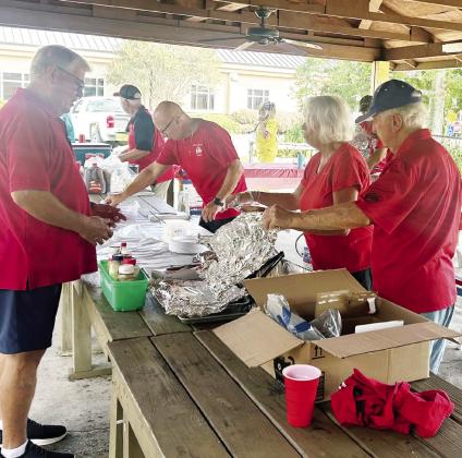 Members of Lake Oconee Elks Lodge 2849 visited the Georgia War Veterans Home in Milledgeville Sept. 22, where they hosted a fish fry for residents there. The Elks served up hand-breaded catfish, fries, hush puppies, and coleslaw, with everyone also enjoying ice cream for dessert. CONTRIBUTED
