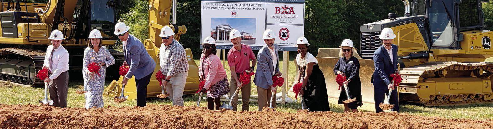 Morgan county Board members, and the schools’ administration break ground to begin construction on the new K-5 facility. SKYLA MORRIS/Staff