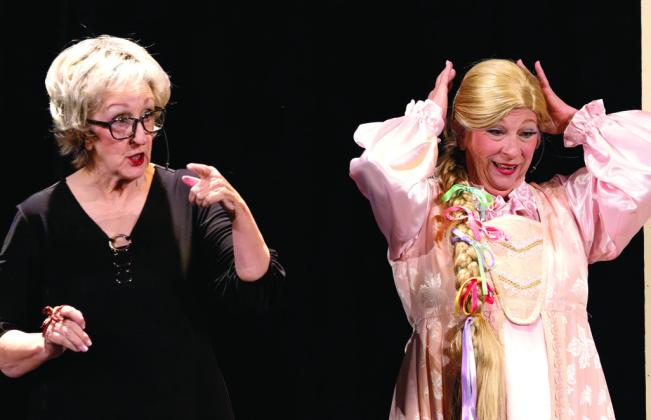 Juliet (Suzanne Vest) gets ready to meet the bachelors she did not select while Judy Lange (Sherry Shutze) waits. LEIGH LOFGREN/Staff