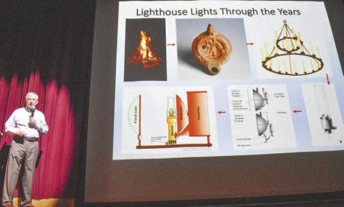 Dr. William Rawlings discusses lighthouse lights over the years. ILENA HENSLEY/Staff