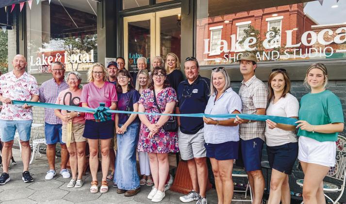 Lake & Local cut the ribbon to their new location alongside Chamber of Commerce members The Palms on Main and The Boat Shop. CONTRIBUTED