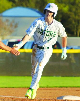 Gatewood senior Ben Brannen rounds the bases after hitting his first home run of the season on March 13 against Trinity Christian. TREY NORRIS/Staff