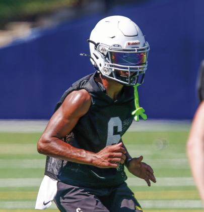 LOA two-way standout Kam Geter works through a drill during practice earlier this summer as the Titans prepare for the upcoming season. LANCE McCURLEY/Staff