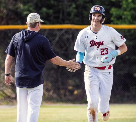 Morgan County senior Ty Tillery rounds the bases after hitting a grand slam against Pike County April 3. SKYLA MORRIS/Staff