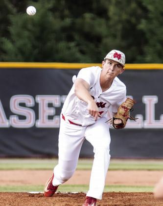Morgan County senior pitcher Davis Strickland fires a pitch from the mound during a recent game. SKYLA MORRIS/Staff