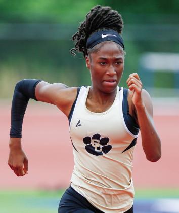 Junior Maleah Jarrells qualified for the state sectional meet in three events, placing first in the 100-meter hurdles and high jump, and second in the 300-meter hurdles. LANCE McCURLEY/Staff