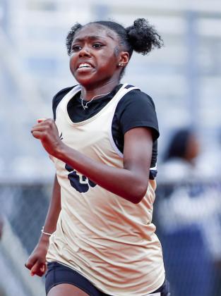 Junior Carmen Freeman qualified for the state meet as part of both relay squads, helping the 4x100-meter relay team to a fourth-place finish and the 4x200-meter relay team to a third-place finish. LANCE McCURLEY/Staff