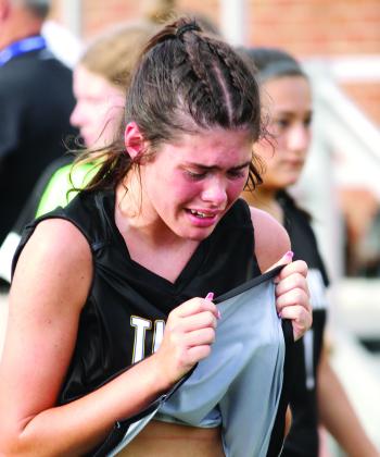 Lake Oconee Academy junior Victoria Goubran (15) sheds tears after the Lady Titans' 2-1 loss to Aquinas in the state championship game on Tuesday. (BRAD HARRISON/Staff)