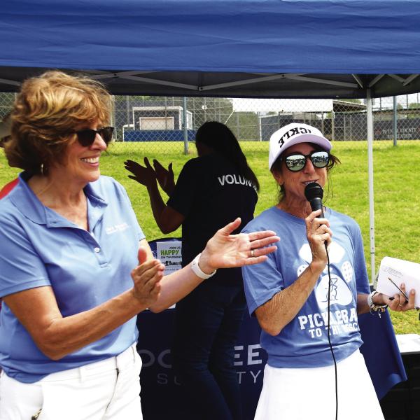 Lake Oconee Humane Society Board President Barbara Gniewek (left) and Central Georgia USA Pickleball Ambassador Kelley Chitwood joined in making the announcement April 18, of raising more than $11,000 for animal care and advocacy in Lake Country. IAN TOCHER/ Staff