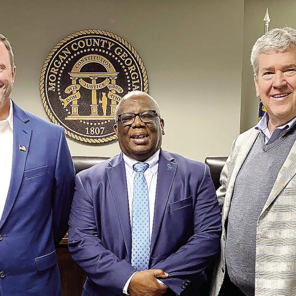 New District 1 Commissioner Carl Jones (center) and new District 5 Commissioner Nathan Park (left) were sworn in by Probate Judge Charles W. Merritt Jr. on March 27. Jones and Park served their first county commission meeting on April 1. CONTRIBUTED