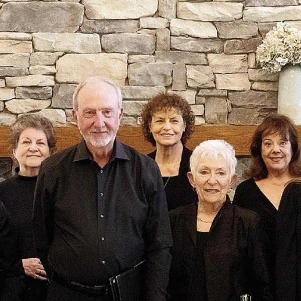 Members of the East Georgia Concert Chorale include (back row, l-r): Joe Williams, Hal Meeks, Jana Williams, Suzanne Vest, Carol Grant, Linda Hammett, Sandy Williamson, Rusty Faulk, Donna Valvo, Margie Heimer, Norris McElroy, and Dave Heimer, with (front row, l-r): Bruce Angier, Tom Bantly, Jenny Moore, Carol Gracko, Brian Williams, Katie Price, Brenda Austin, Karinne Fish, Cindy Coker, Lewis Hammett, Frank Casara. Not pictured are Rosie Herrmann, Drace Langford, and Tom Balestreire. LEIGH LOFGREN/Staff