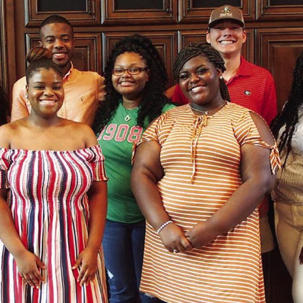 Greg and Anna Lawton with ATLAS scholarship recipients, honoring Greg’s legacy of mentorship, faith, and investment in Greene County students. CONTRIBUTED