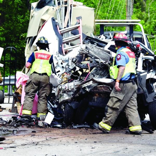 Three men died after the pickup truck they were in crashed into the left rear of a tractor-trailer stopped for a traffic light on Hwy. 441 at Twin Bridges Road in Putnam County. IAN TOCHER/Staff