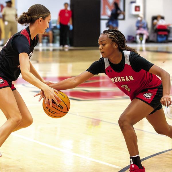 Morgan County’s Addisyn Freeman (3) guards Whitley Crumbley during a recent scrimmage. SKYLA MORRIS/Staff