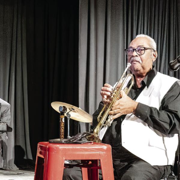 The John Dunn Band performed onstage throughout the evening. LEIGH LOFGREN/Staff