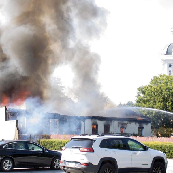 Thanks to hard work by firefighters, the historic Morgan County Courthouse in the background was spared any damage from the fire. SKYLA MORRIS/Staff