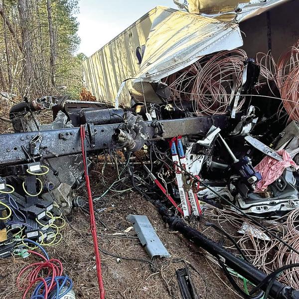 A truck driver wound up pinned under the cargo he was hauling after an I-20 crash. CONTRIBUTED