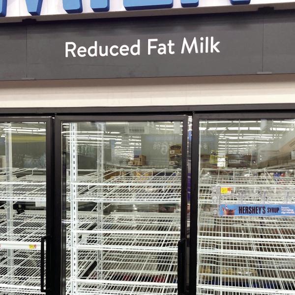 The milk shelves at Walmart in Madison were bare after victims of Hurricane Helene to the east traveled west to search for supplies. T. MICHAEL STONE/Staff