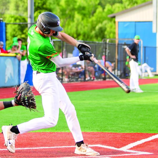 A Wild Things hitter connects on a pitch, driving it to right field. SKYLA MORRIS/Staff