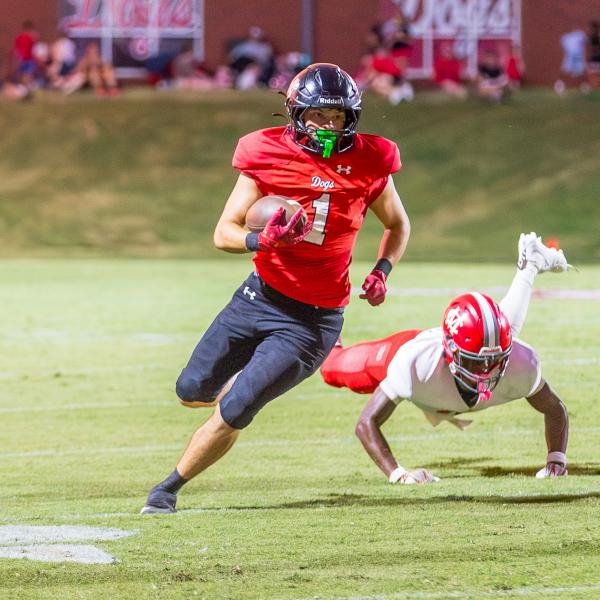 Morgan County senior running back Alex Corrias (1) breaks into the open field against Madison County. SKYLA MORRIS/Staff