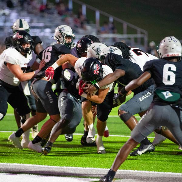 Morgan County senior running back Alex Corrias (1) powers through the heart of the Eastside defense for a touchdown. SKYLA MORRIS/Staff