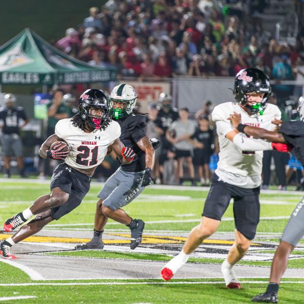 Morgan County sophomore Running back Aiden Lawrence makes a run down field in a game earlier in the season. SKYLA MORRIS/Staff