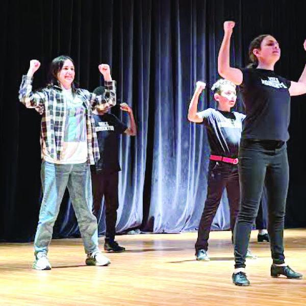 The Arts Barn cloggers dance to the song “High and Mighty” by Christ Church Choir and Dolly Parton.