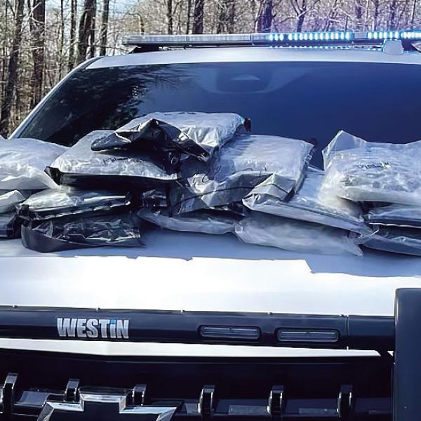 What started as a traffic stop ended with a man and dog in custody after the discovery of 15 vacuumsealed bags filled with approximately one pound of marijuana each. CONTRIBUTED