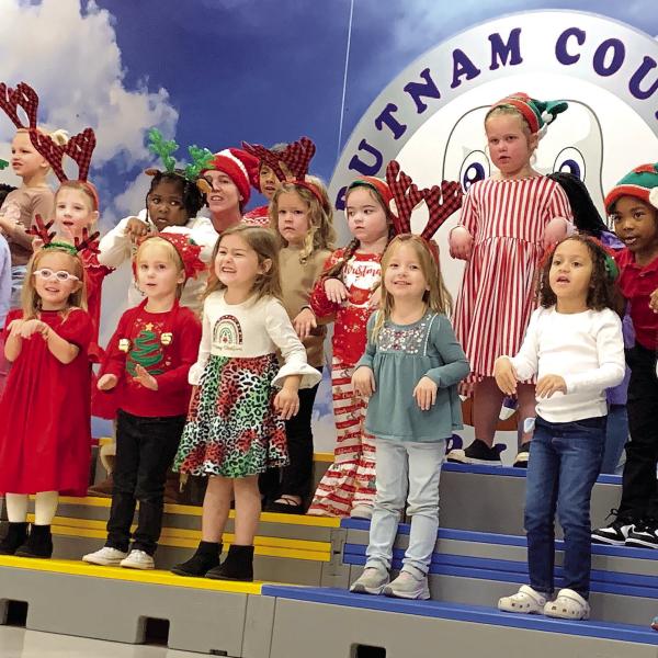 The Pre-K Carolers close the showcase by singing The Reindeer Pokey. BAILEY MCCULLY/Staff