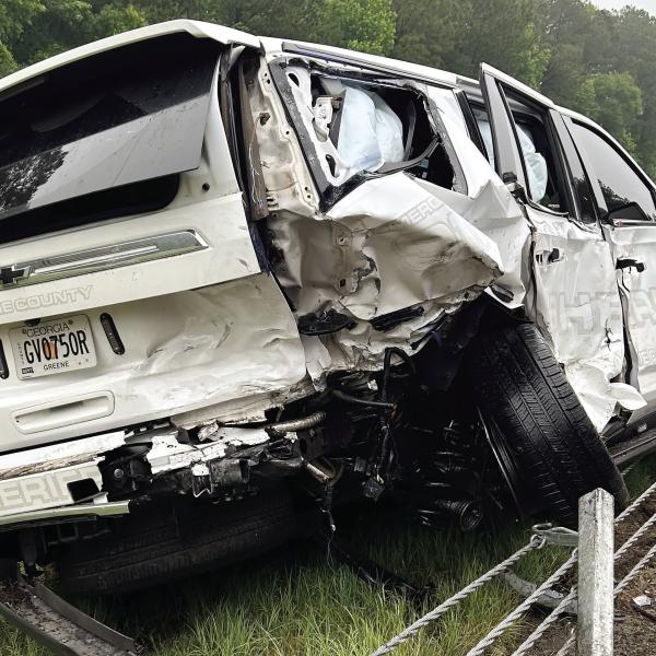 Sgt. Will Smith’s Chevy Tahoe was hit so hard the vehicle flew over the median barrier before landing in the median. CONTRIBUTED