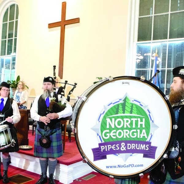 Musicians of the Athens Piper Band perform at the First Presbyterian Church of Greensboro. (LEIGH LOFGREN/Staff)